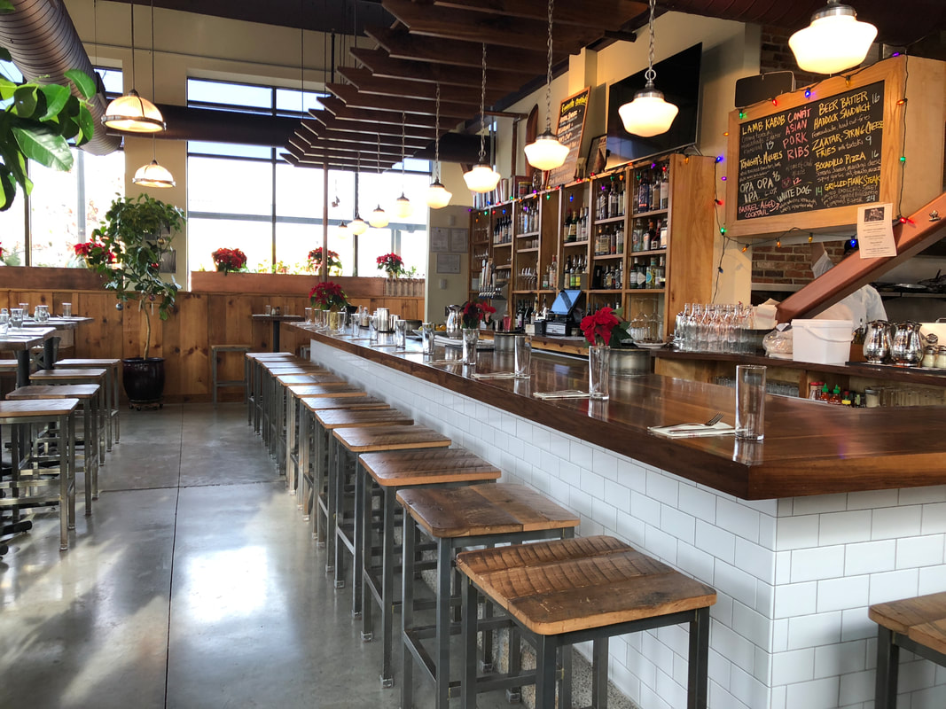 A photo of the inside of a pizza shop